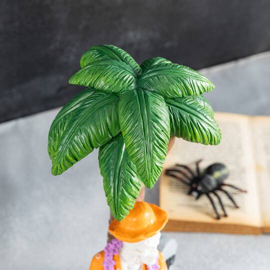 Glitzhome® 11.5" Halloween Polyresin Skeleton on Beach Table Decor